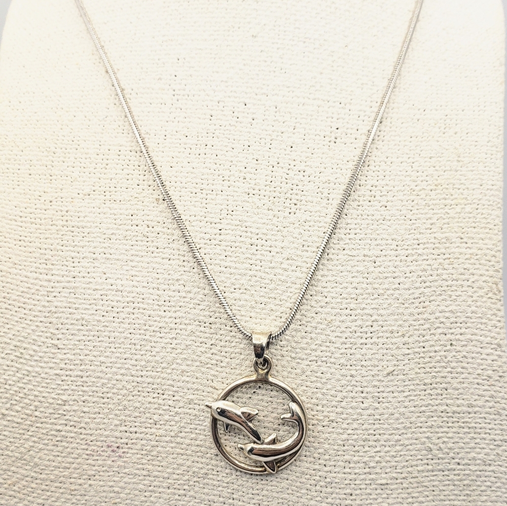 Sterling Silver pendant showing a Two Dolphins jumping through a hoop. - Picture 3 of 3